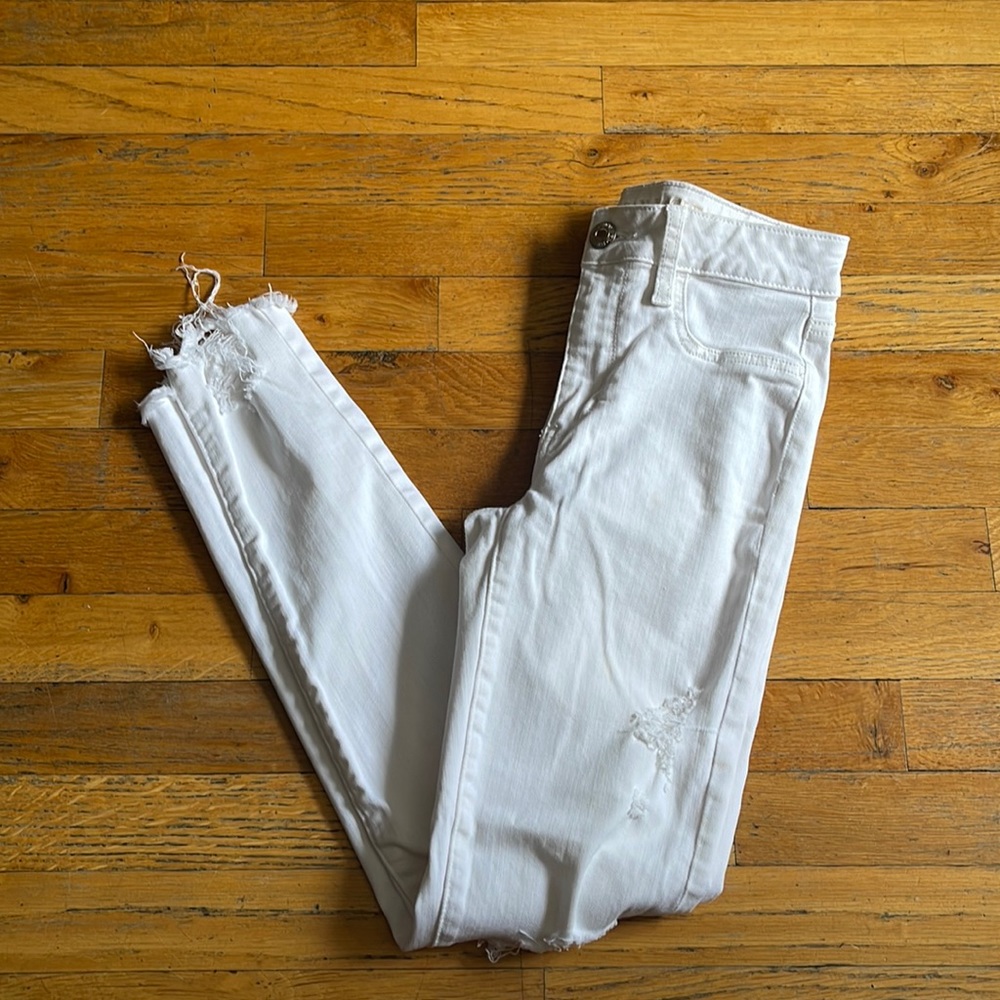 SOLD … AMERICAN EAGLE RIPPED JEANS